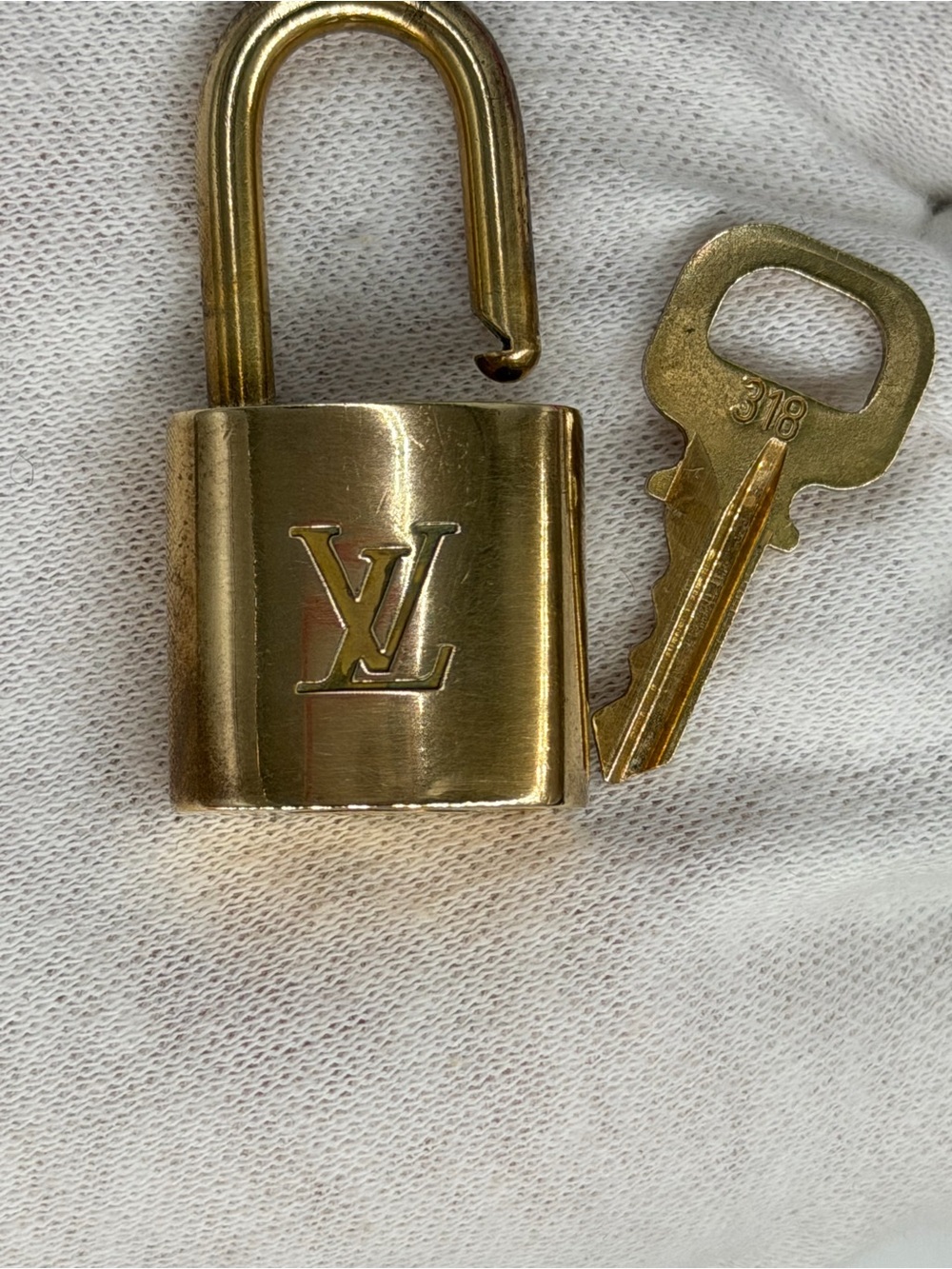 Authentic Louis Vuitton Gold-Tone LV Lock and Key Set - Picture 4 of 8